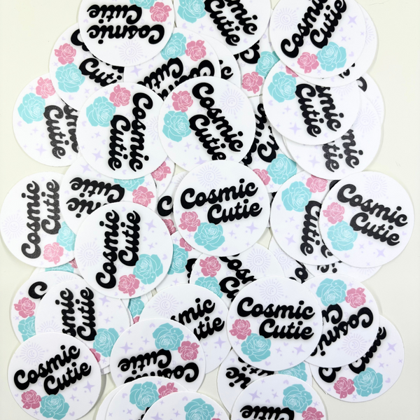 Multiple 'Cosmic Cutie' stickers on a white background