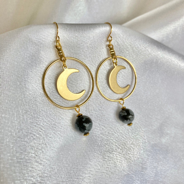 gold moon hoop earrings with snowflake obsidian gemstones. Light Language infused jewelry for energy healing and self love. 