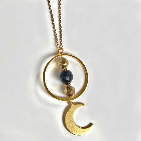 gold moon necklace with black obsidian gemstones and gold crescent moon