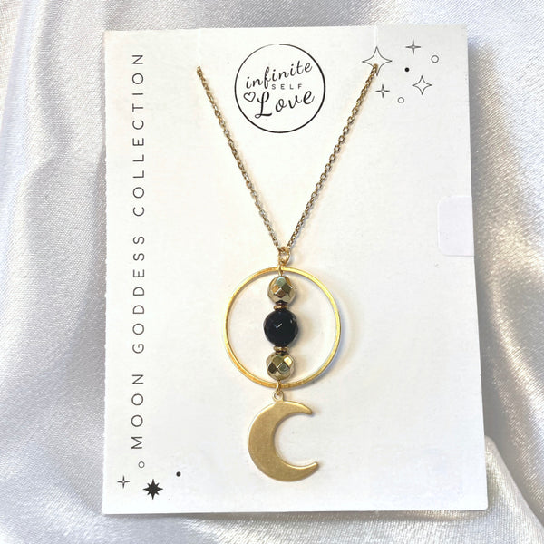 gold moon necklace with obsidian gemstones and gold crescent moon. Light language infused gemstone jewelry for self love and energy healing