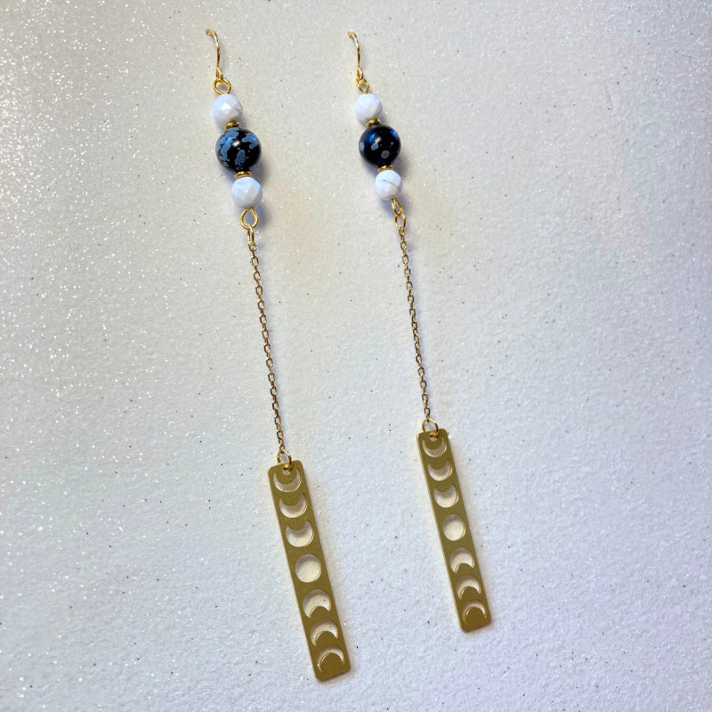gold moon phases dangle earrings with snowflake obsidian and white howlite gemstones