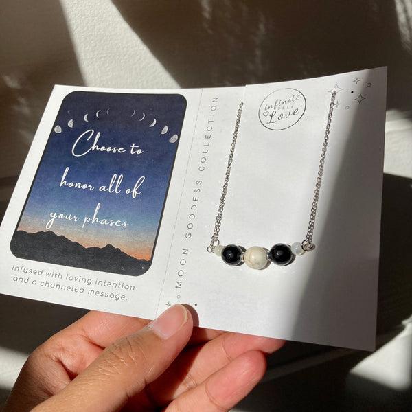 silver stainless steel gemstone necklace with howlite and black obsidian gemstones
