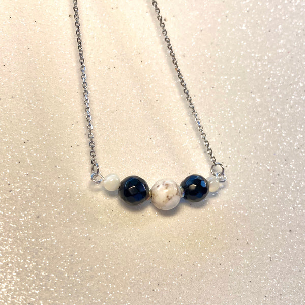 silver stainless steel gemstone necklace with howlite and black obsidian gemstones