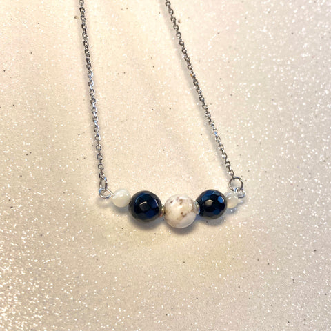 silver stainless steel gemstone necklace with howlite and black obsidian gemstones